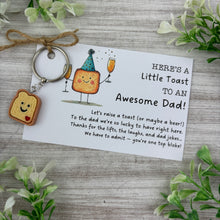 Load image into Gallery viewer, Here’s A Little Toast To An Awesome Dad Keyring