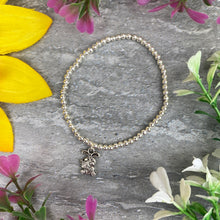 Load image into Gallery viewer, A little Gift From The Easter Bunny Floral Beaded Bracelet
