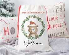 Load image into Gallery viewer, Personalised Santa Sack | Christmas Gift Bag with Festive Animal &amp; Green Wreath Design
