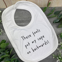 Load image into Gallery viewer, These Fools Put My Cape On Backwards Baby Bib
